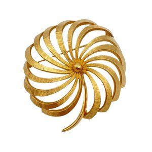 Vintage Monet gold tone pin wheel brooch lapel pin flower